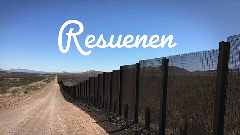 A picture of the US-Mexico border wall with the word "Resuenen" in white in the sky.