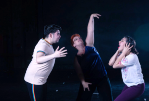 Raven and two other dancers in performance
