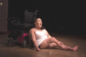 NEVE leaning against a wheelchair