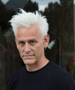 A headshot of Jess Curtis