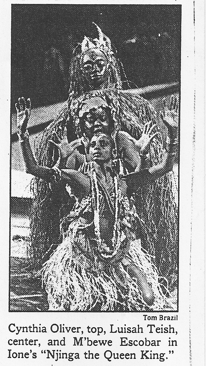 Cut out from the NYTimes featuring three dancers hovering over one another wearing traditional dress.